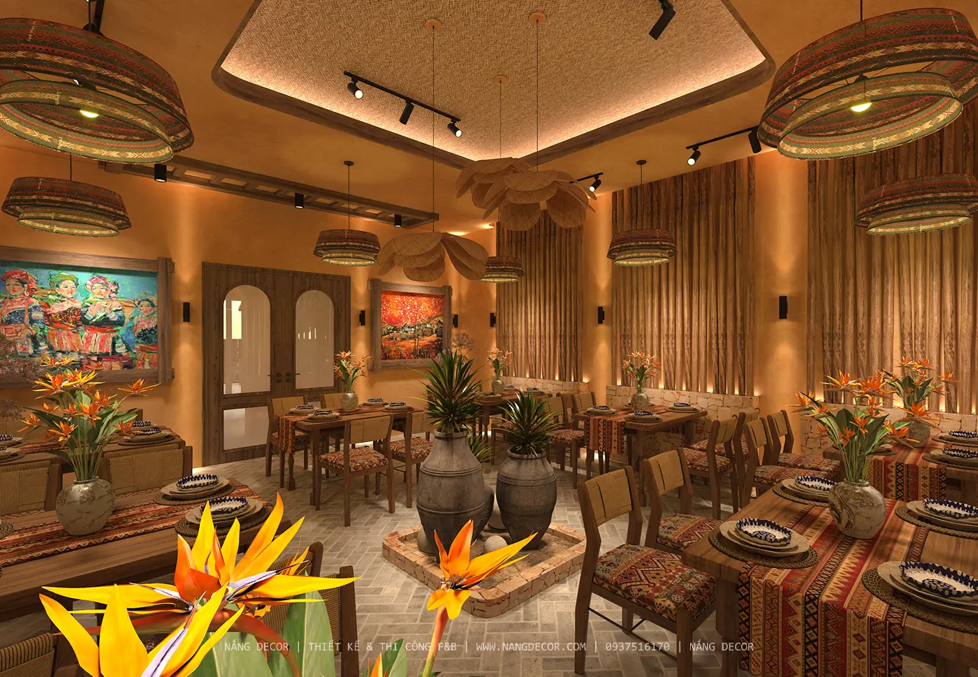 Kiến trúc sư Nắng Decor đang thảo luận về bản vẽ thiết kế nhà hàng với chủ đầu tư.