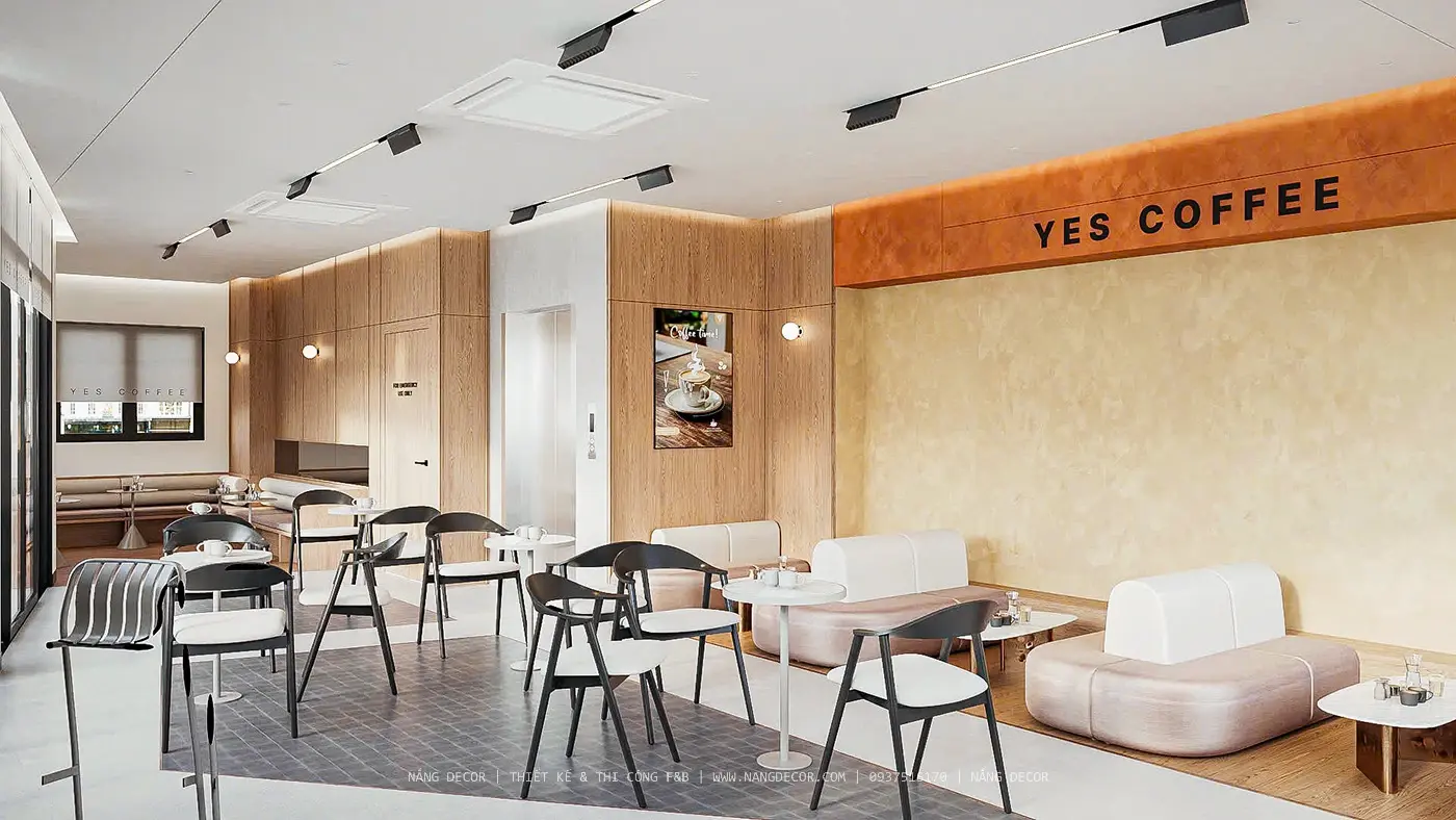 Góc làm việc và thư giãn tại quán cafe với nội thất ấm cúng.