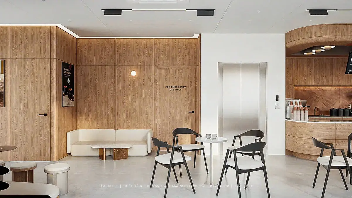 Đội ngũ kiến trúc sư Nắng Decor xem xét bản vẽ AutoCAD quán cà phê